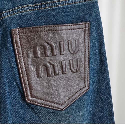 미우미우 여성 브라운 레더 패치 와이드 데님 팬츠